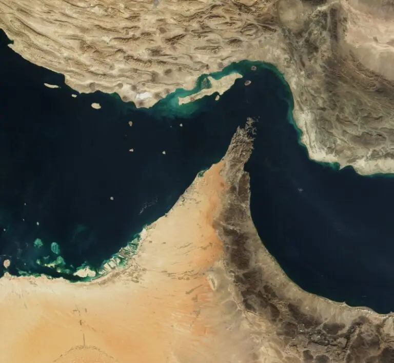 Satellite image of the Strait of Hormuz, showing the narrow maritime passage between Iran and Oman.